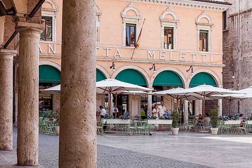 View on the terras and facade of the historical Caffè Meletti in Ascoli Piceno, Marche, Italy (Editorial credit: Marcel Bakker / Shutterstock.com)