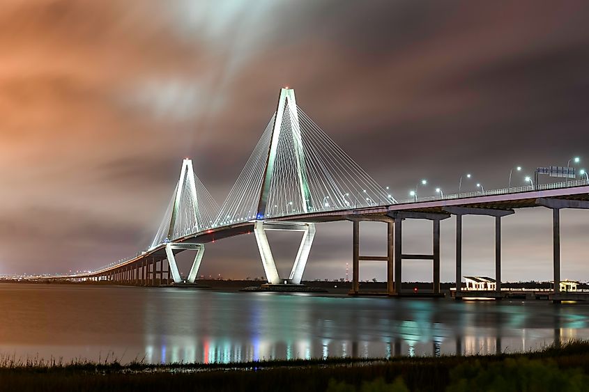 The Arthur Ravenel Jr. Bridge lit up at night in Charleston, South Carolina.