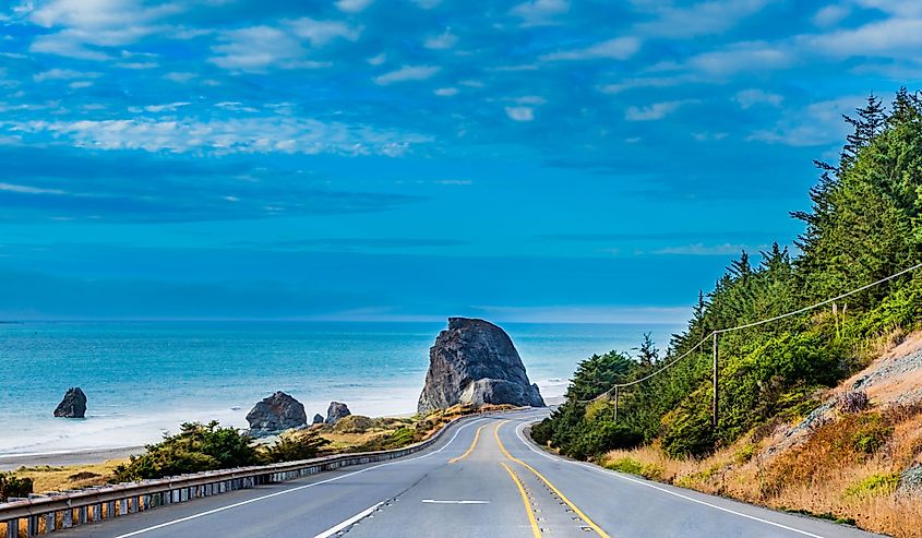 Approaching the legendary roadside rock formation "Kissing Rock" in Gold Beach, Oregon