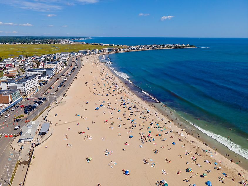 Hampton Beach aerial view including historic waterfront buildings on Ocean Boulevard and Hampton Beach State Park. 