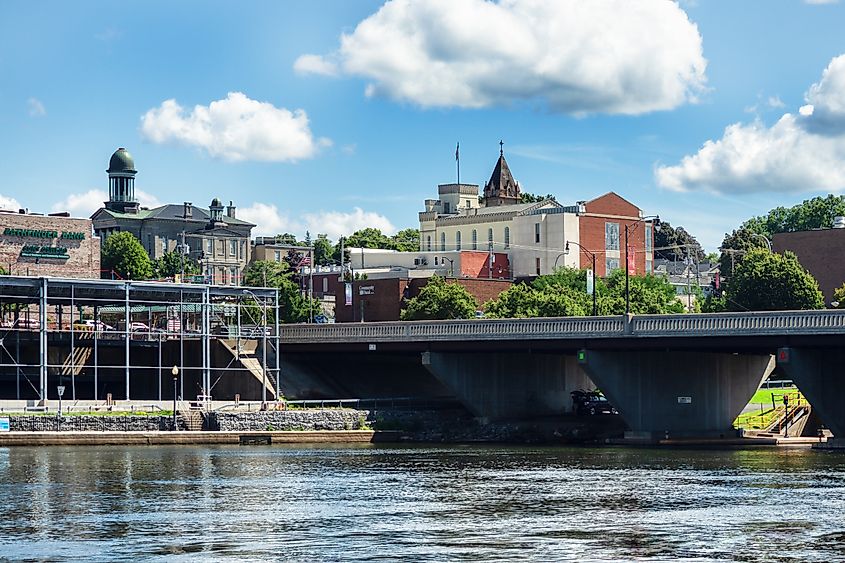 View from the riverwalk in downtown Oswego, New York on a summer afternoon.