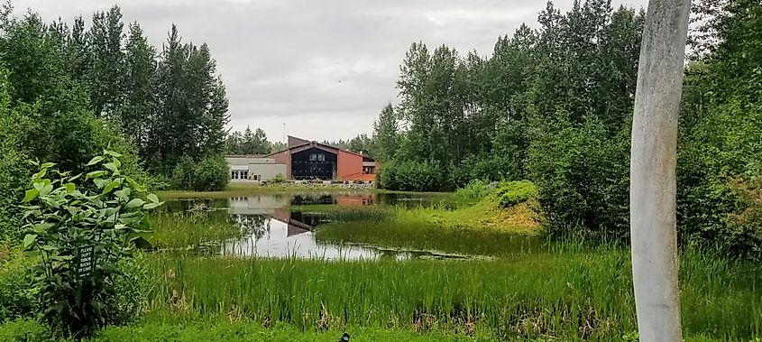 The Alaska Native Heritage Center as seen from across Lake Tiulana.