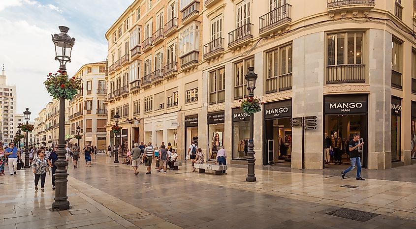 Calle Marques de Larios is a pedestrian and shopping street in Malaga, Spain. Editorial credit: BAHDANOVICH ALENA / Shutterstock.com
