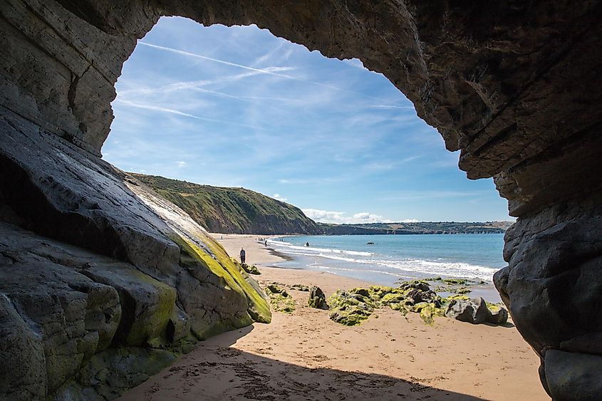 Cave on the sandy beach in Penbryn, Cardigan Bay, Wales.