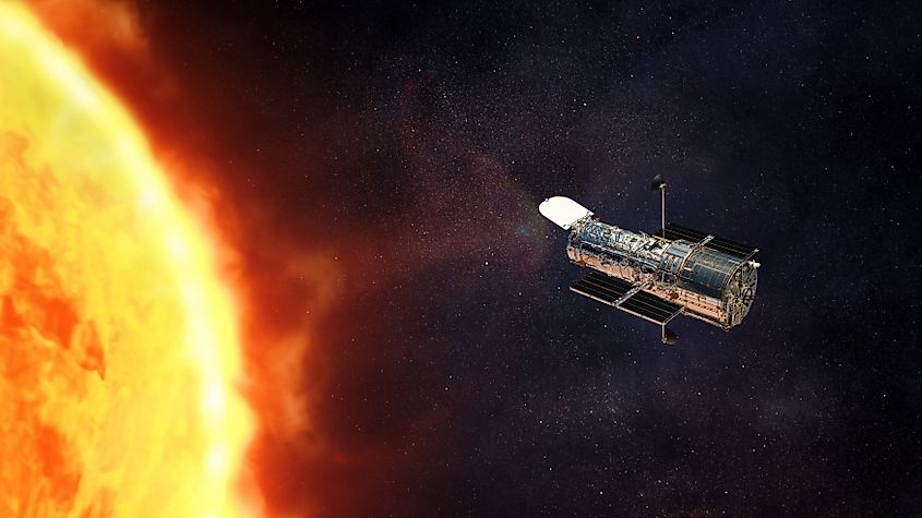 Space telescope, the Hubble, nearby the Sun.