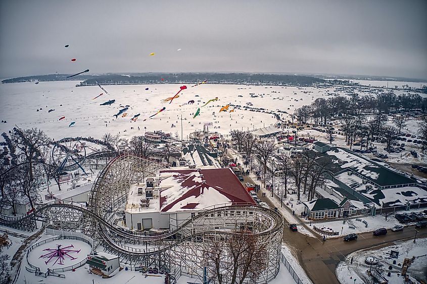 Winter festivities on a hazy day at Lake Okoboji, Iowa from an aerial perspective.