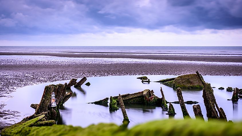 WW2 Operation "Dynamo" barge resting on the beach of Zuydcoote, France.