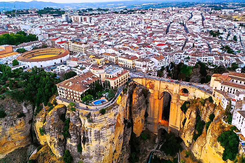 Aerial evening view of New Bridge over Guadalevin River in Ronda, Andalusia, Spain