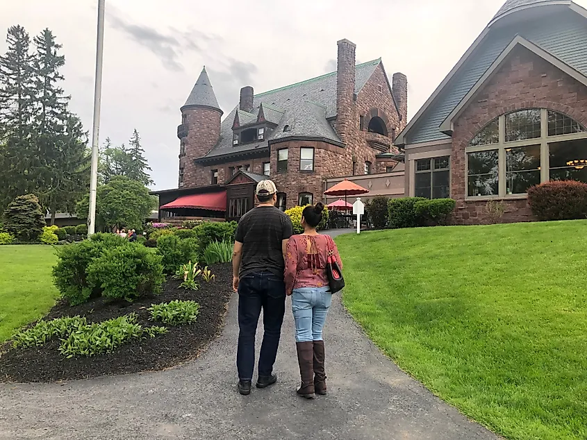 A couple admiring the Belhurst Castle in Geneva, New York.