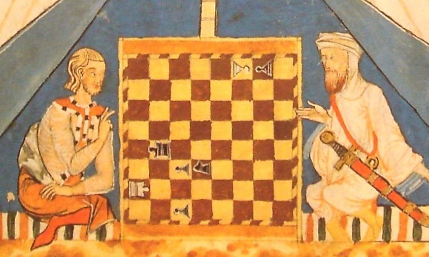 A Christian and a Muslim play chess in 13th century Al-Andalus