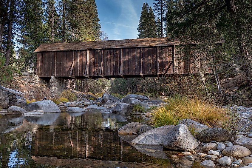 A view of Yosemite Wawona covered Bridge over the Merced River by Mariposa, California