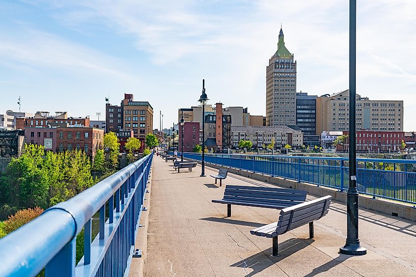 Skyline of Rochester, New York along the Pont De Rennes Pedestrian Bridge which is part of the Genesee Riverway Trail
