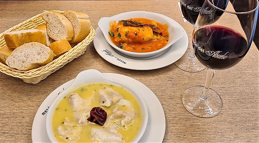 Cod in green sauce and cod in Riojana sauce served at a restaurant in the old town of Logroño, Spain.