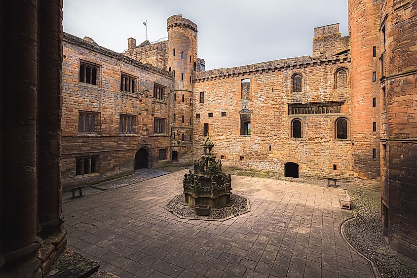 Linlithgow, Scotland - May 25 2019: 16th century courtyard at the historic Linlithgow Palace, birthplace of Mary Queen of Scots in West Lothian, Scotland