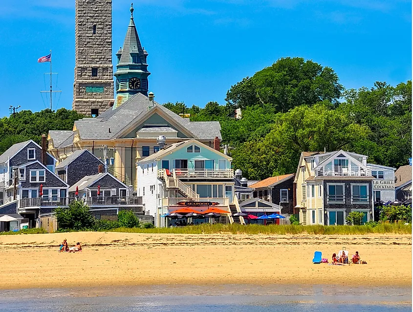 Beach view of Provincetown, with the Pilgrim's monument in the background.