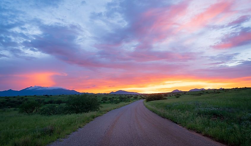 Fire sunset in Sonoita, Arizona. Santa Rita mountains in distance