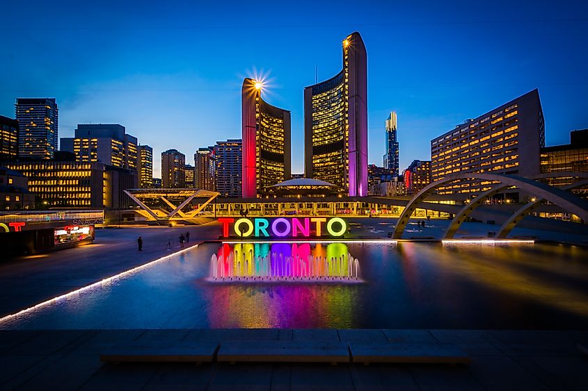Nathan Phillips Square and Toronto Sign in downtown at night, in Toronto, Ontario.