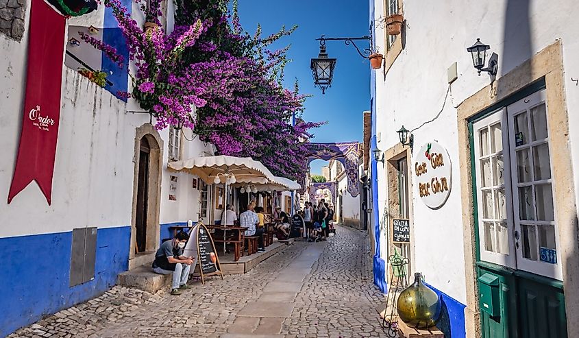 Rua Direita medieval street in Obidos town, Portugal.