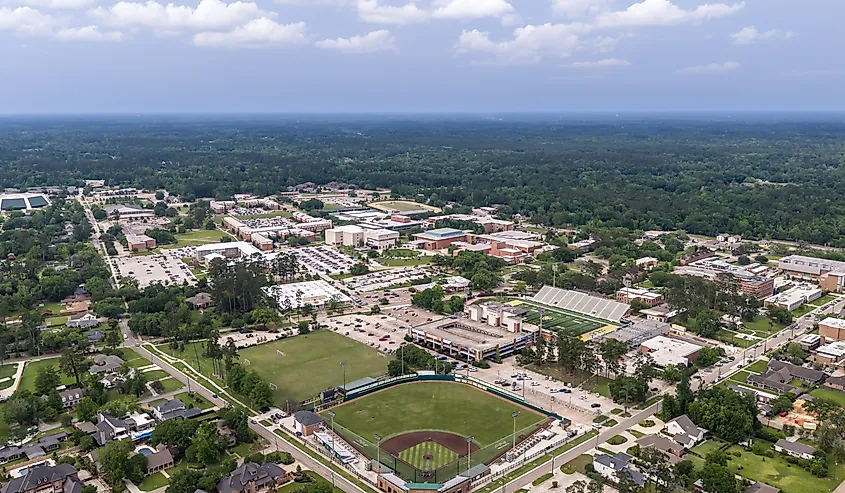 A wide aerial drone photograph of Southeastern Louisiana University's campus in Hammond, Tangipahoa Parish, Louisiana.
