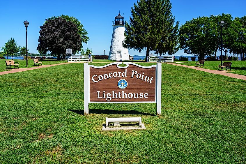 Havre de Grace, MD, USA – August 13, 2022: A large sign at the Concord Point Lighthouse at the edge of the Chesapeake Bay shore.