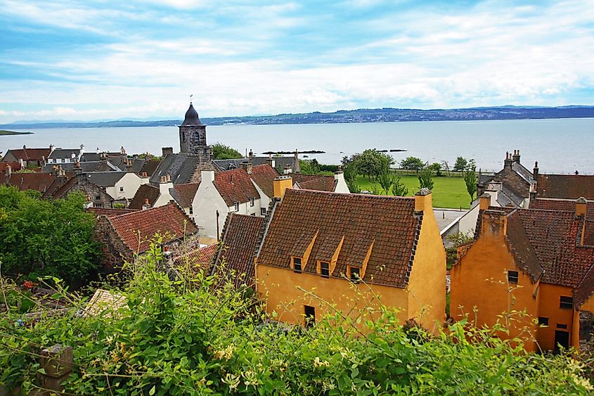 A view across the roof tops towards the Firth of Forth at Culross, Scotland on a summers day