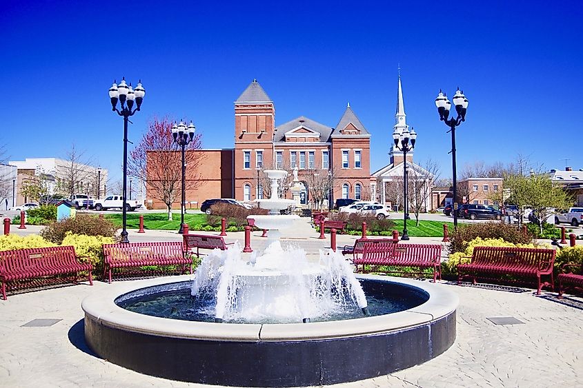 Fountain on the courthouse square in McMinnville, Tennessee, United States, with the Warren County Courthouse rising in the background