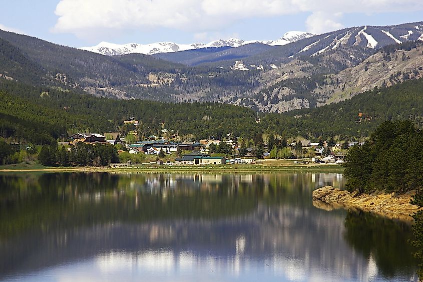 Barker Reservoir with Nederland and Rocky Mountains in the background, via Vicki L. Miller / Shutterstock.com