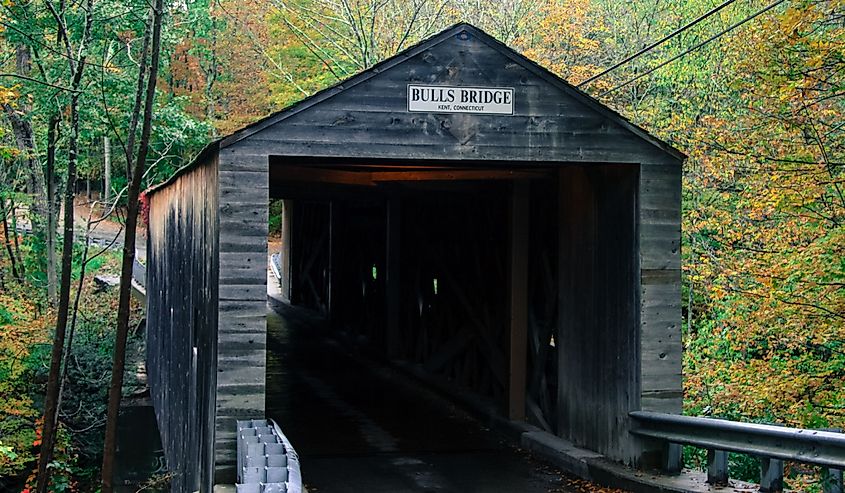 Bull's Bridge crossing the Housatonic River with fall colors in Kent, Connecticut