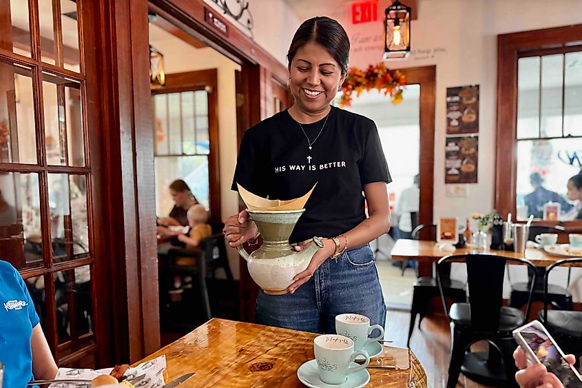 Susana Martinez at Susana's Cafe pouring coffee Image credit Bryan Dearsley