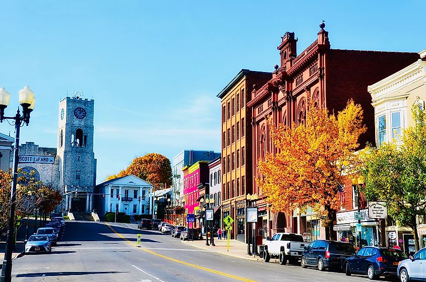 Geneva, New York: Downtown cityscape with buildings along a street.