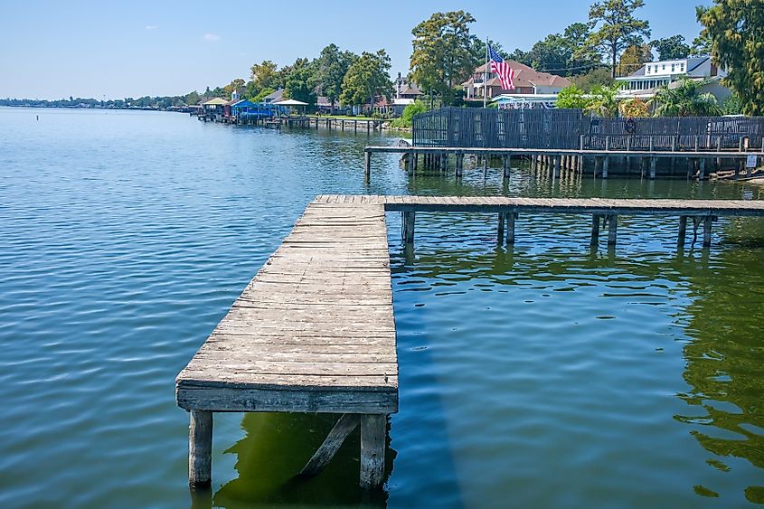 Shoreline with piers and houses on False River, an Oxbow Lake of the Mississippi River.