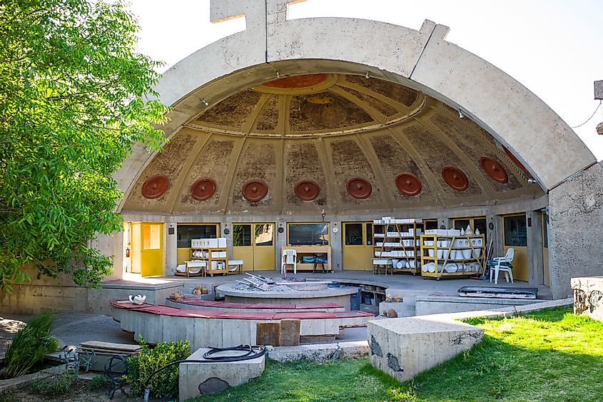 Arcosanti is an experimental town in central Arizona open to tourists and sightseer's, via DBSOCAL / Shutterstock.com