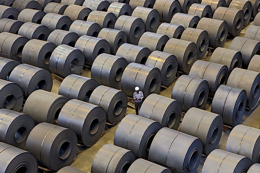 Top view of produced steel coils arranged in rows for inspection in a steel plant in Jharkhand, India.