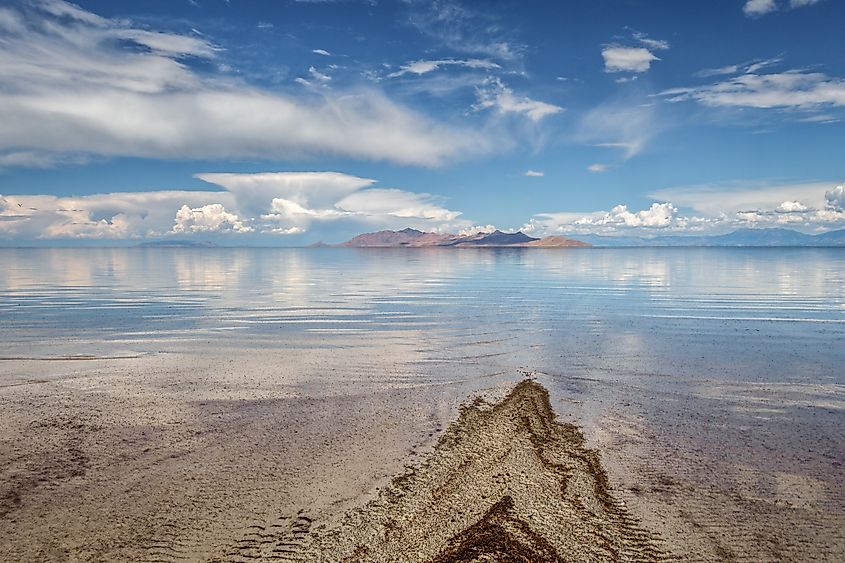 Mountains reflected in the Great Salt Lake outside of Salt Lake City, Utah, US.