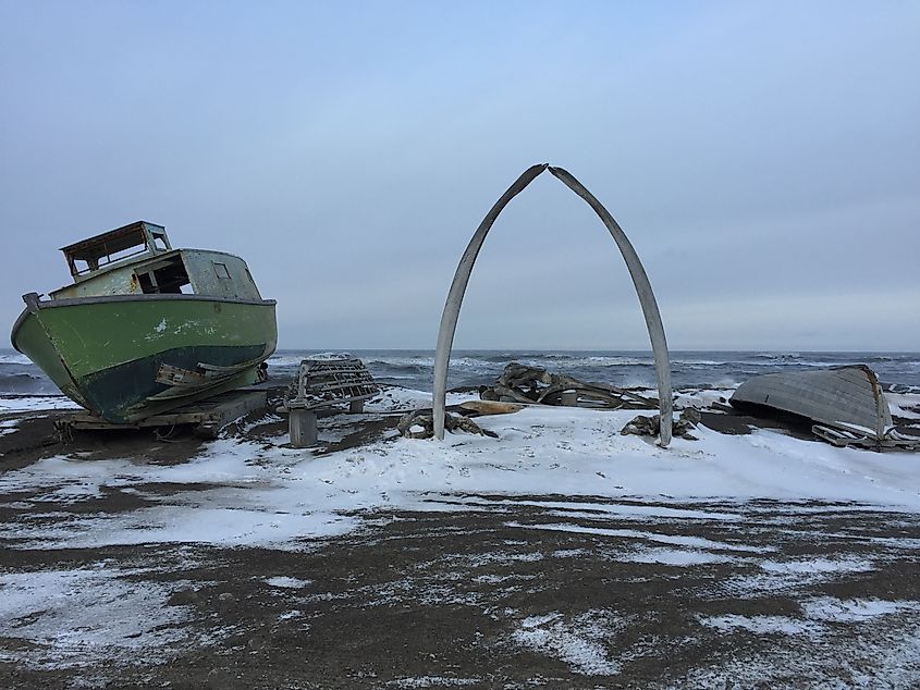 Utqiagvik, Alaska August 15, 2016. AKA Barrow, Alaska AKA Top of the world. Northernmost point in America with whale bones put up for tourist to take pictures with. Via Shutterstock / santourena