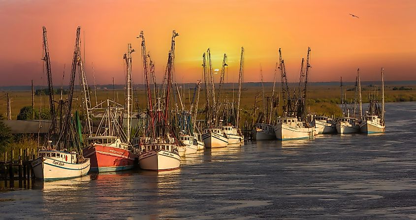 Shrimp boats tied up at a dock along the Darien River in Darien, Georgia.