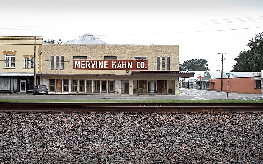 Rail line in front of the old Mervine Kahn Co. building in Rayne, Louisiana.