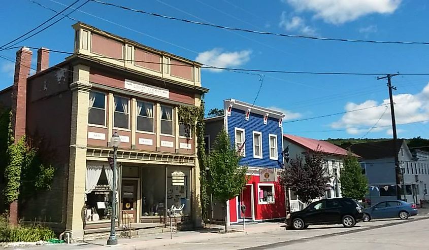 Facade of buildings and cars on Church Street, Hawley, Pennsylvania.