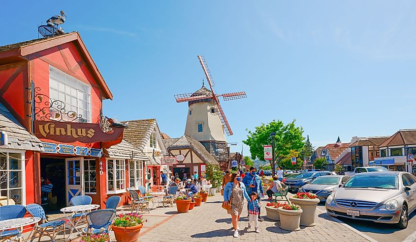 ain street, street view, and tourists in Solvang, beautiful small town in California, town has known for its traditional Danish style architecture
