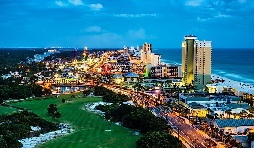 Panama City Beach, Florida, view of Front Beach Road at night during blue hour.