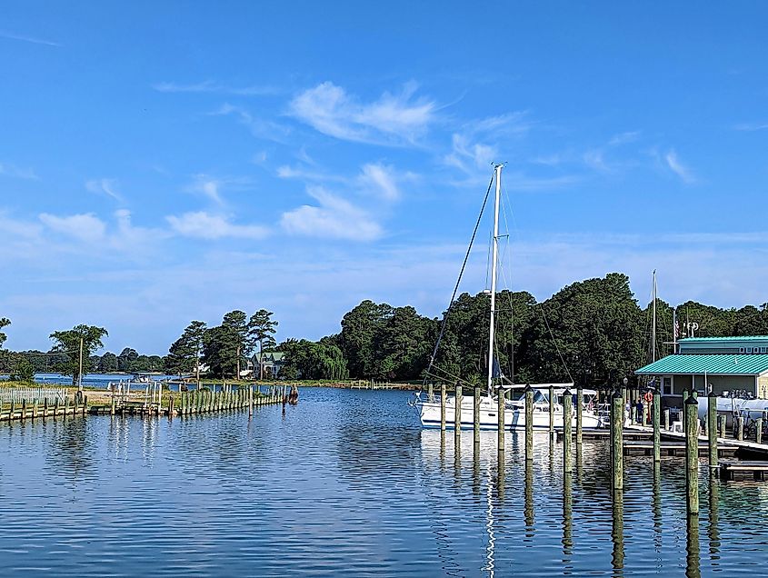 Sailboat in marina at the center of Onancock, Virginia.