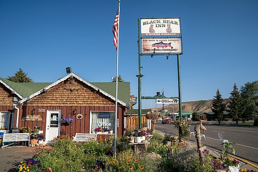  Sign and office for the Black Bear Inn, a small motel in downtown Dubois Wyoming, via melissamn / Shutterstock.com