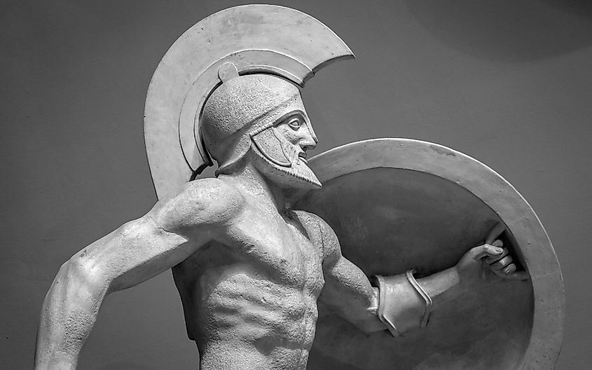 Head in helmet Greek ancient sculpture of warrior.