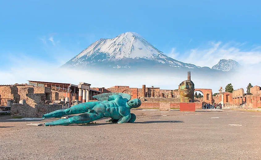 Ancient Roman city of Pompeii on the background Vesuvius volcano