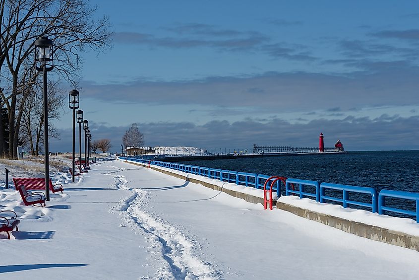 Winter snow with footprints along the pier in Grand Haven, Michigan.