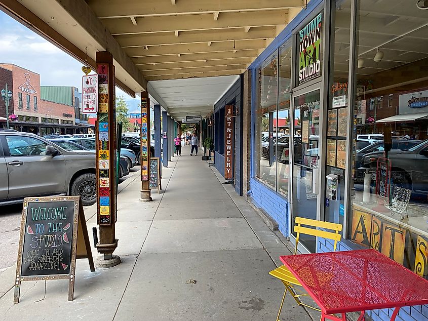 Colorful decals a commercial art studio kicks off the Old West-style walkway of downtown Whitefish, Montana.