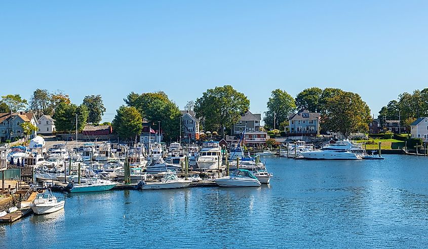 Cove Marina and yachts on Pawtuxet River mouth to Providence River in fall in Pawtuxet Village between city of Cranston and Warwick, Rhode Island RI, USA.