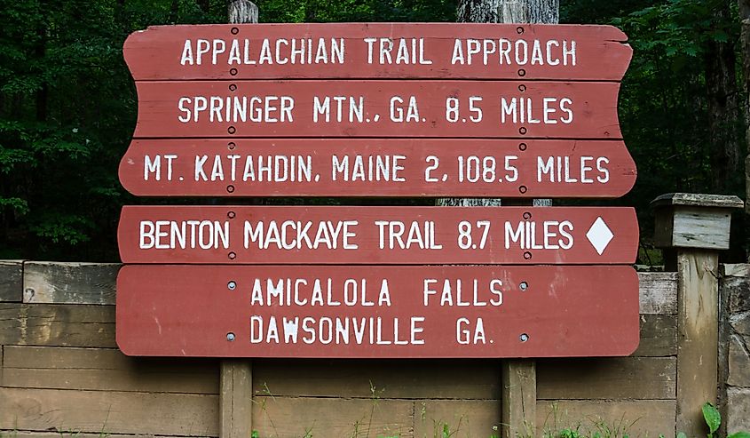 A painted sign gives the distance to Maine from Georgia on the Appalachian Trail