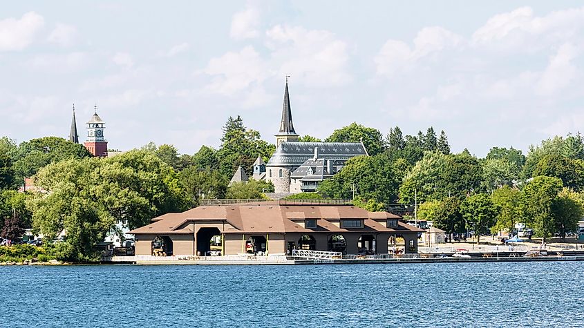 Gananoque, Ontario, Canada: The Thousand Islands Boat Museum with the Gananoque skyline in the background.