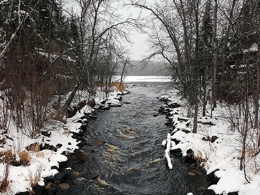 Snow falls along the Embarrass River in north eastern Minnesota.